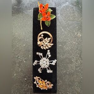 Vintage Trifari Gold Brooch x 2, vintage floral and vintage starburst brooch